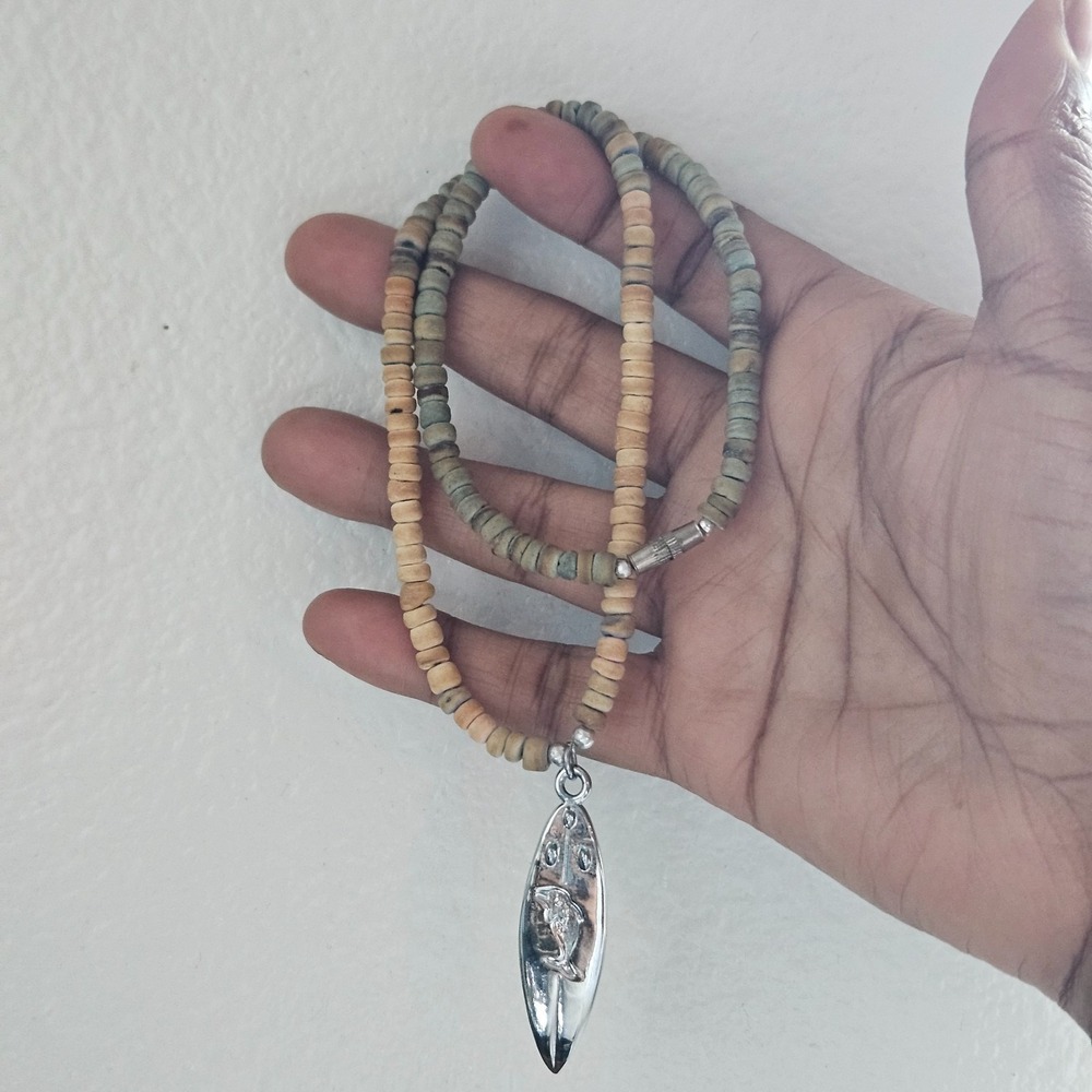 Native Treasure‎ surfboard and coconut bead necklace beachy dolphin pendant